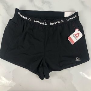 Brand new with tag Reebok relaxed short with side pockets. Black Size M